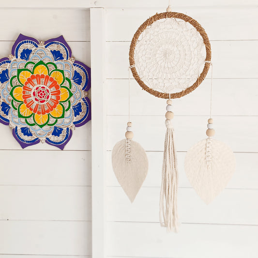 Bring peace, balance, and natural elegance into your home with this handmade Medium Natural Elemental Spirits Dream Catcher. Crafted with love and care on the spiritually blessed island of Bali, this vegan-friendly piece is made entirely from natural materials, free of feathers. Its earthy tones and organic textures create a warm and grounding presence, perfect for bedrooms, meditation spaces, or as a thoughtful gift.