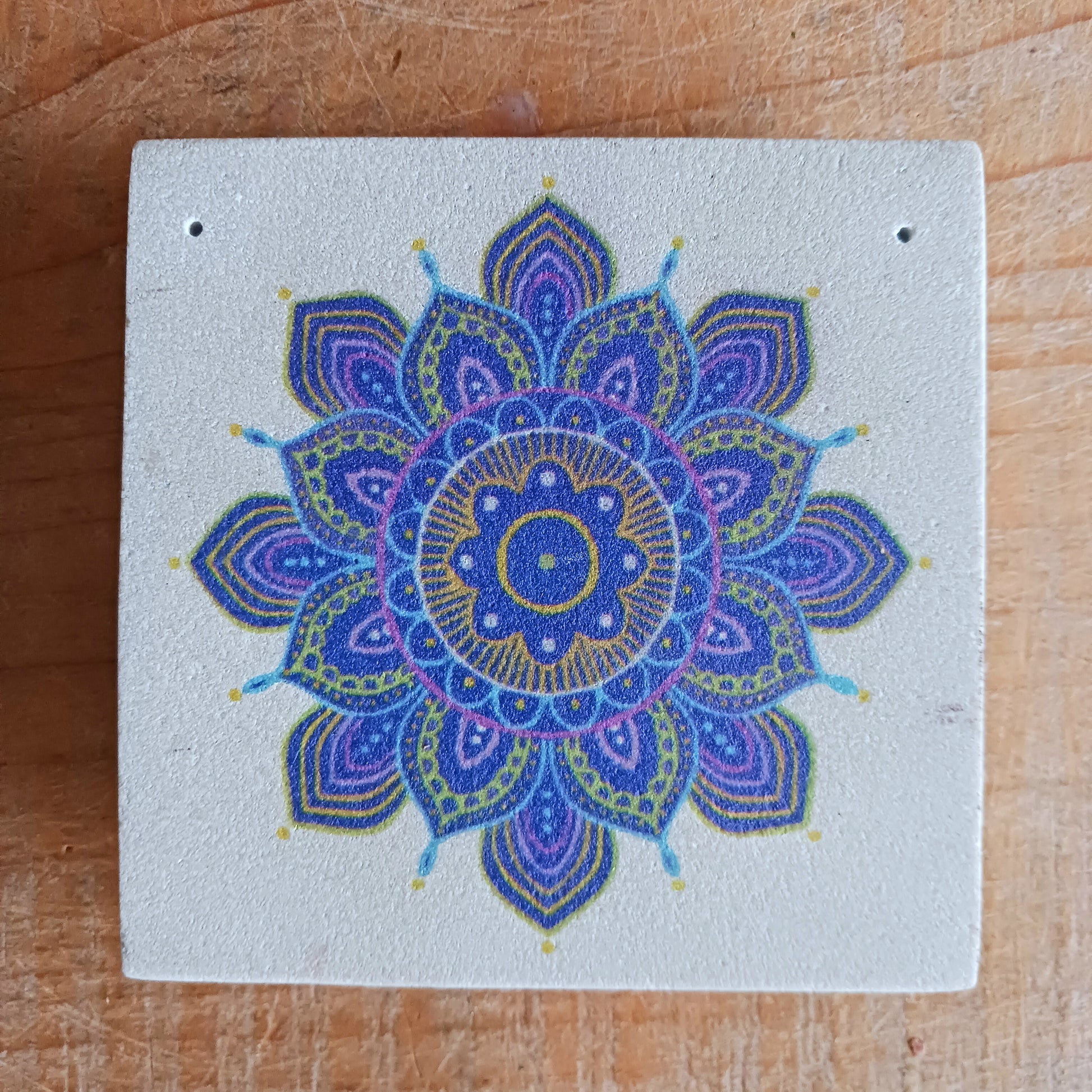 Incense burner, made of sandstone with mandala print featuring 2 holes for Indian incense sticks. 