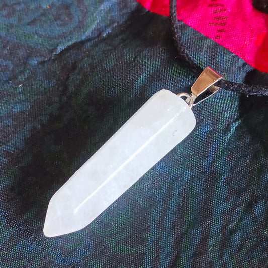 Embrace the natural power of rock crystal with this elegant pendant on a sleek black cord necklace. Known as a master healing stone, rock crystal energises the body, purifies the aura, and enhances inner strength. 