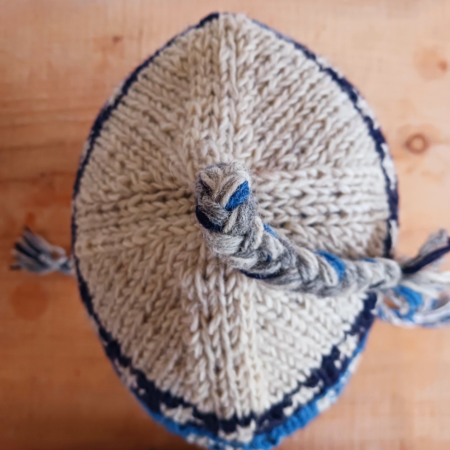 Stay cozy and stylish with our handmade chunky wool earflap hats, crafted in Nepal by skilled women artisans in Kathmandu. Each hat is 100% pure wool and features a soft polar fleece lining for extra warmth and comfort. Perfect for cold winter days, outdoor adventures, or adding a touch of handmade charm to your look.