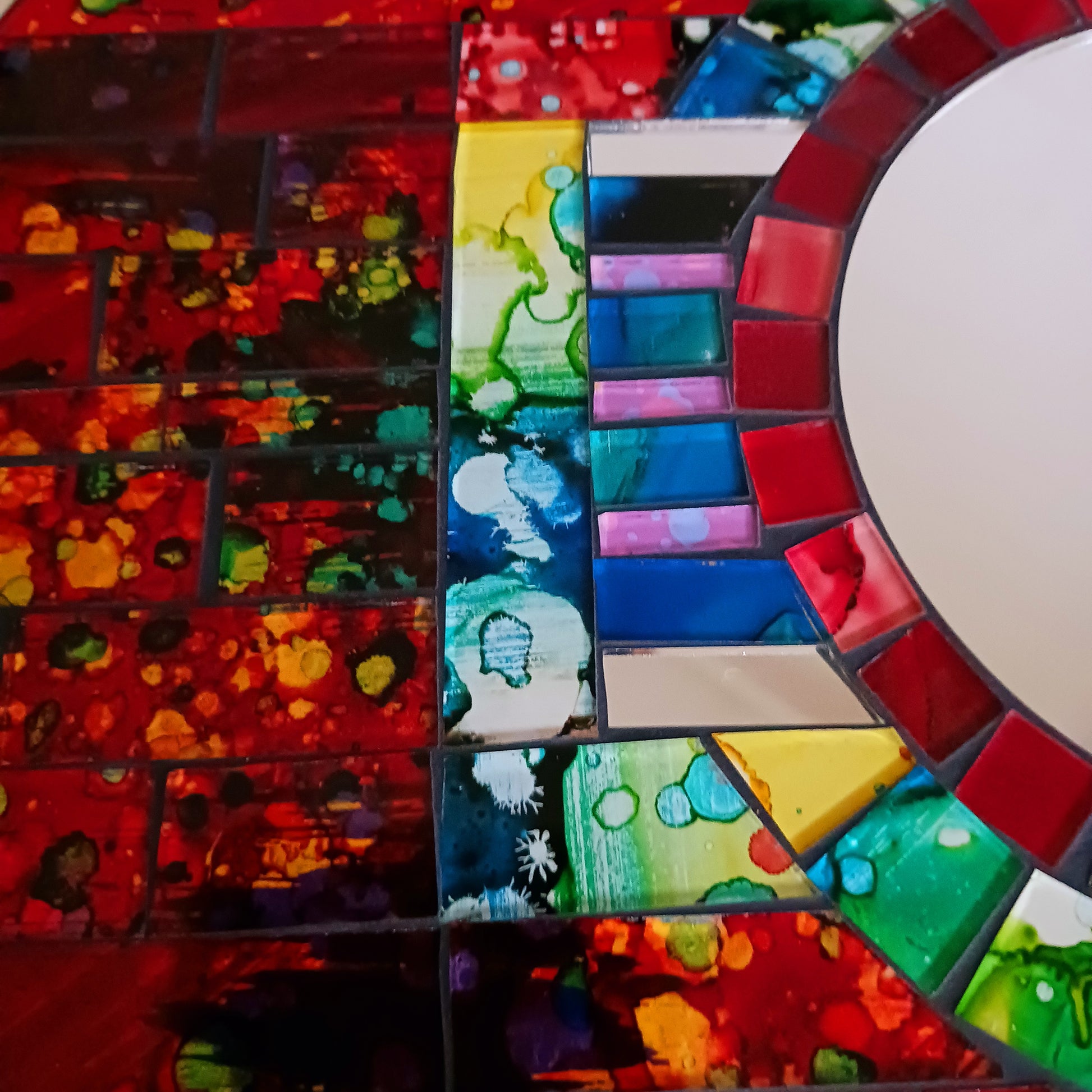 Handcrafted from shimmering, individually placed glass tiles, this stunning guitar-shaped glass mosaic mirror blends creativity, rhythm, and craftsmanship into one striking wall décor accent.