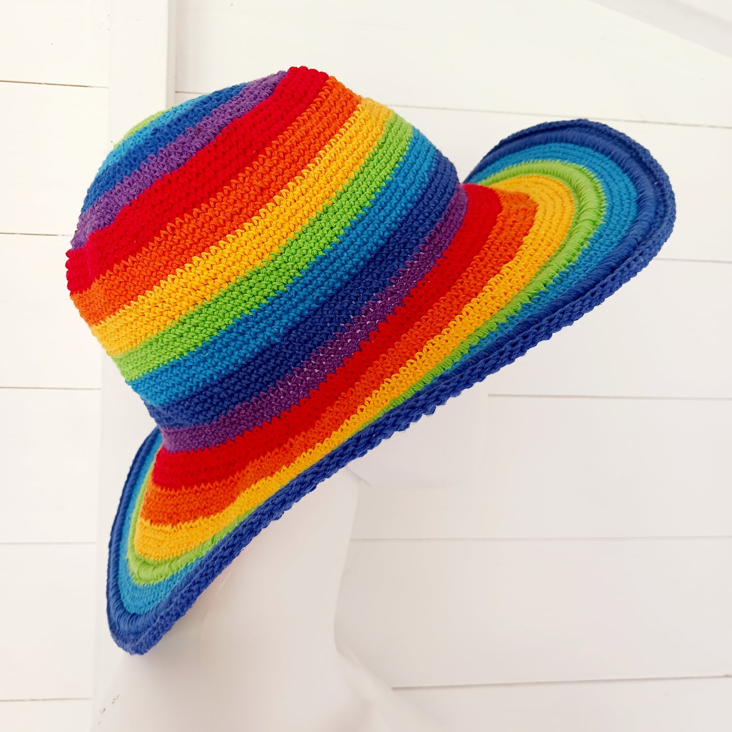 Brighten up your summer with this vibrant handmade crochet cotton sun hat! Featuring a stunning rainbow pattern, this unique hat is perfect for holidays, beach days, and festivals.