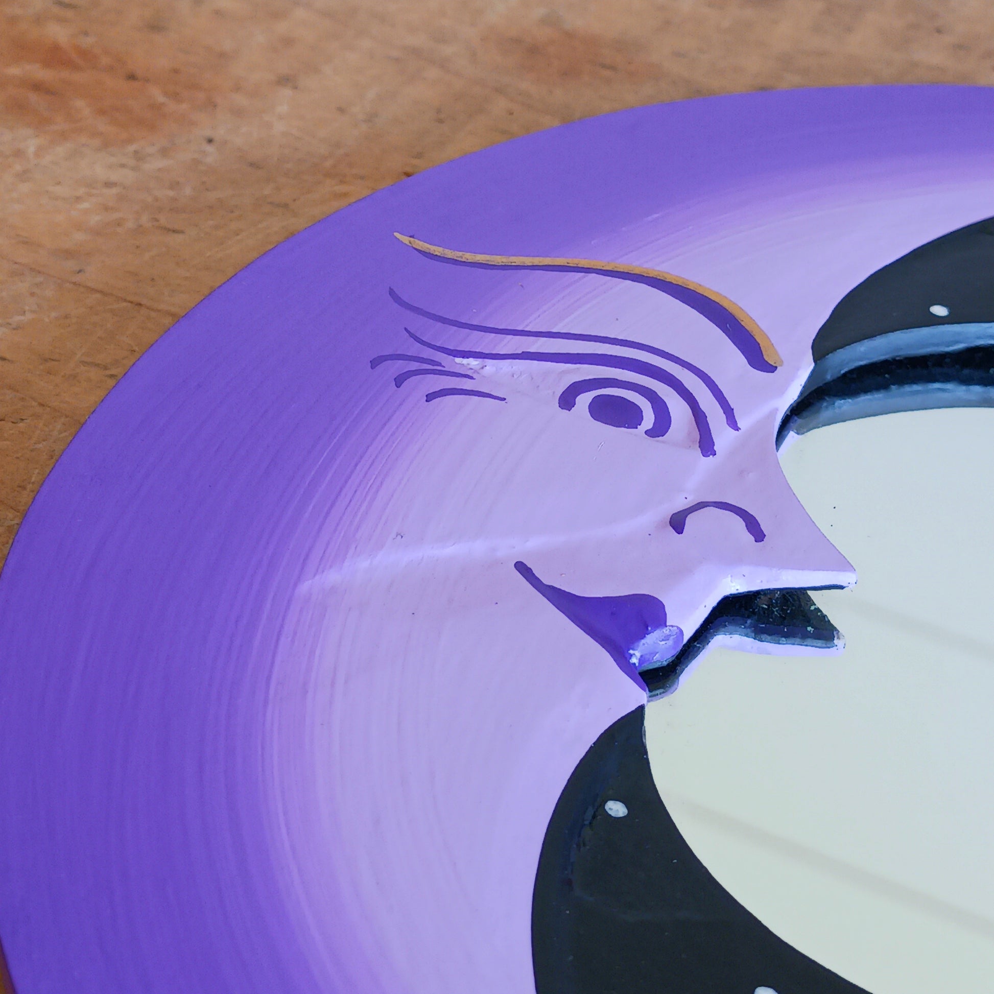 Bring celestial charm and positive energy into your home with this little Handmade Purple Moon Mirror. Carefully crafted by Fair Trade artisans, this unique decorative mirror features a stunning purple crescent moon design that adds a mystical and spiritual touch to any room.