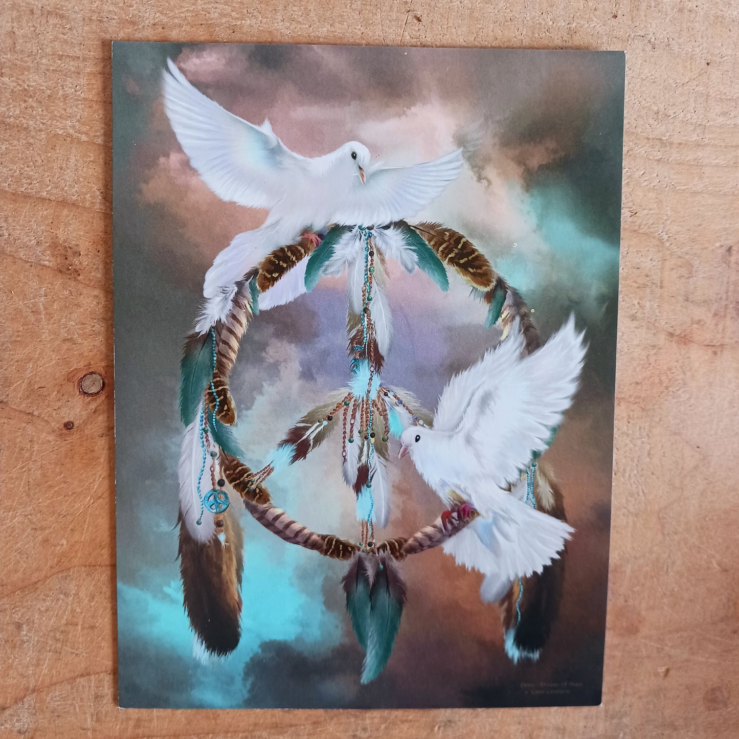 Beautifully illustrated Doves and dreamcatcher greetings card. The card is blank for you to write your own message inside.