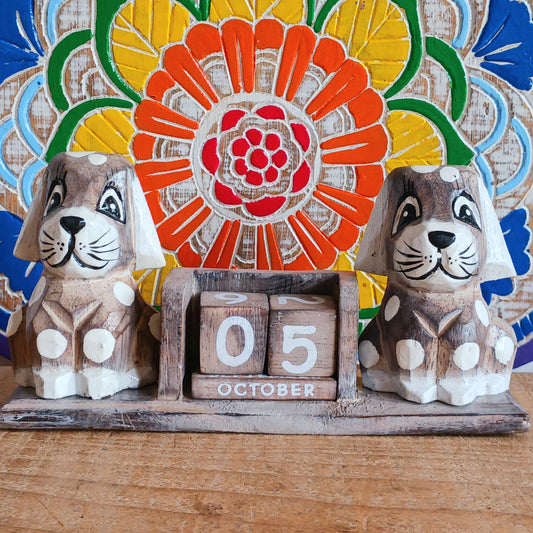 Fall in love with our charming Wooden Dogs Calendar! Crafted with care and designed to brighten any space, this unique calendar features playful wooden dog accents that bring warmth and personality to your home or office. Perfect for dog lovers, it’s both practical and decorative—helping you keep track of dates while celebrating your love for four-legged friends. Whether as a thoughtful gift or a cozy addition to your own decor, this must-have calendar will keep tails wagging all year round!