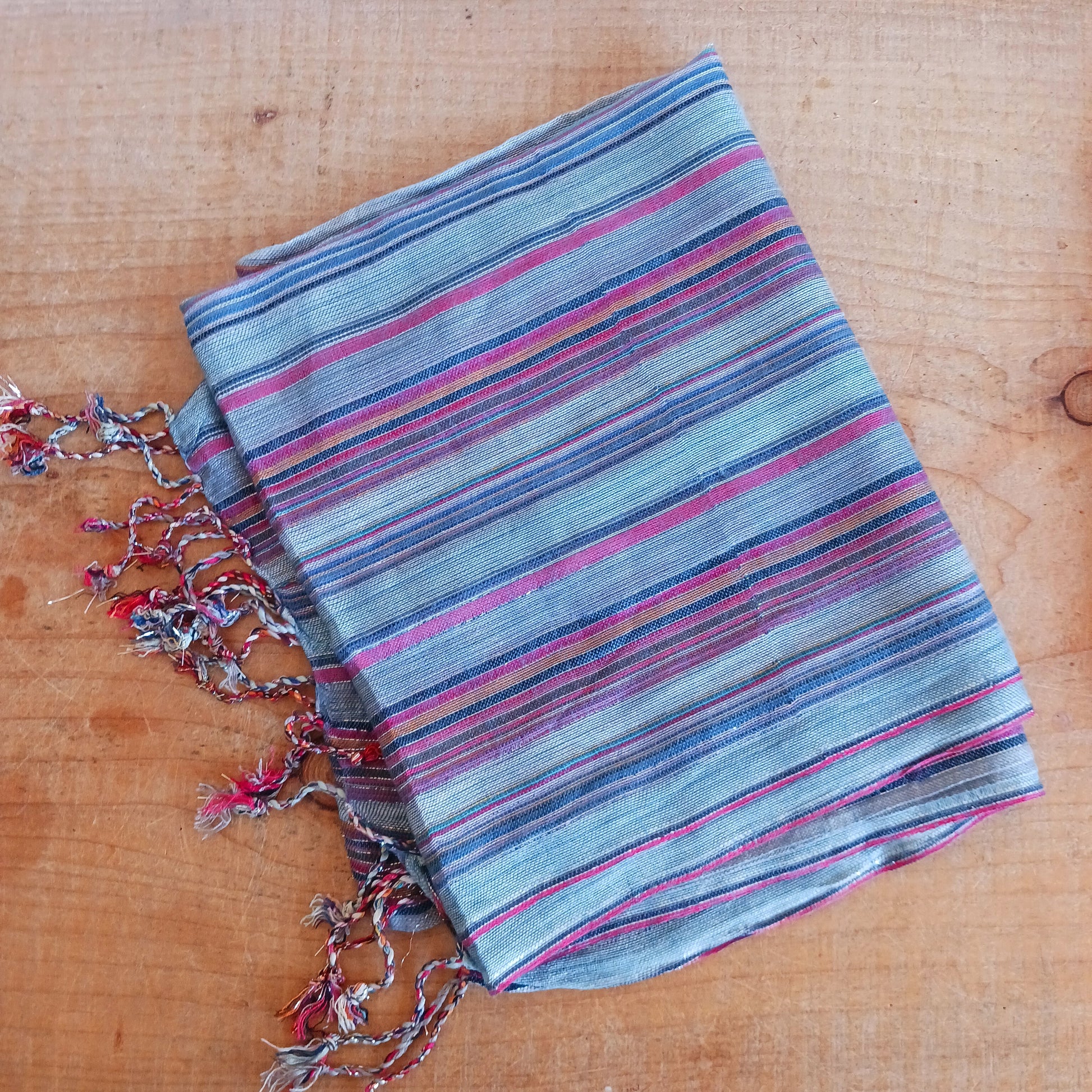 Immerse yourself in the alluring world of bohemian fashion with this delicate Indian Boho Scarf. Crafted with care, each scarf captures the essence of India's free-spirited charm, adding a touch of Boho elegance to your outfit.