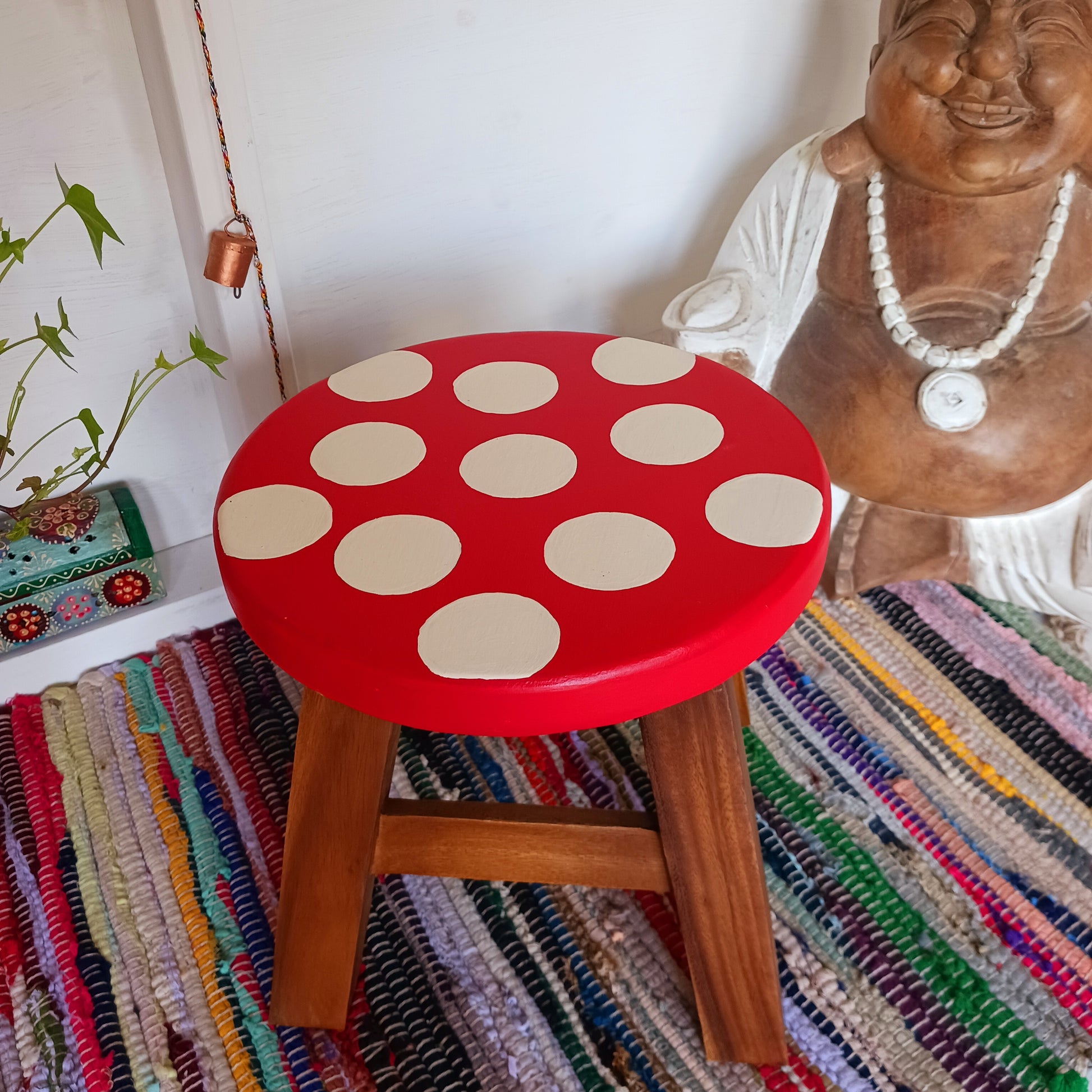 This cute little stool has been hand painted to look like a mushroom! These cheeky little items are very versatile making great stools for little bums or as tiny tables to add accent to your home. They can also be very useful as a step for those hard to reach high up shelves or even just to put your feet up on, and due to their small form are easy to store.