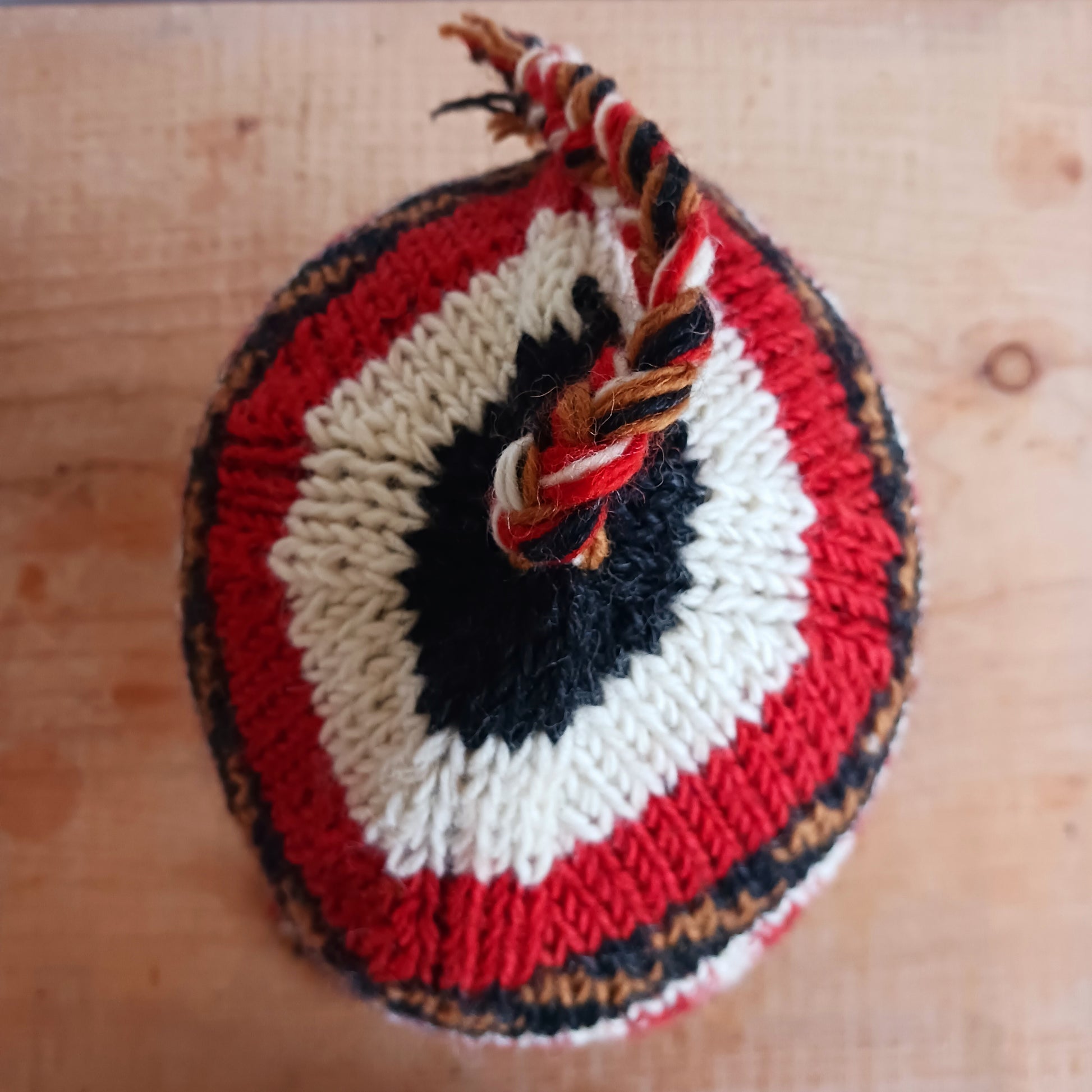 Stay cozy and stylish with our handmade chunky wool earflap hats, crafted in Nepal by skilled women artisans in Kathmandu. Each hat is 100% pure wool and features a soft polar fleece lining for extra warmth and comfort. Perfect for cold winter days, outdoor adventures, or adding a touch of handmade charm to your look.