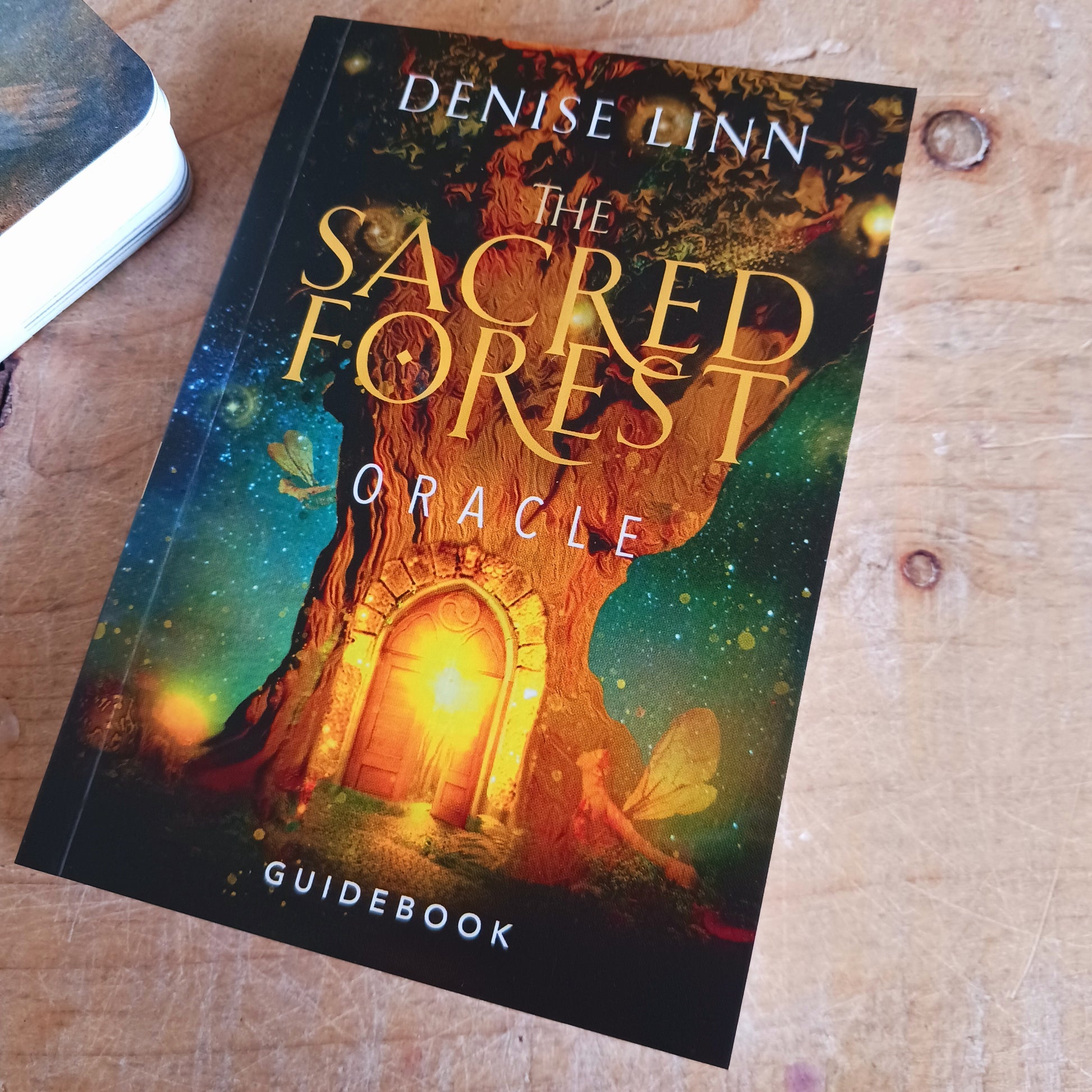 The Sacred Forest Oracle card deck by Denise Linn includes a 52-card deck and 144 page guidebook. This deck opens the user's inner self to expand and enlighten their spiritual journey. Beautifully presented in a matching box.