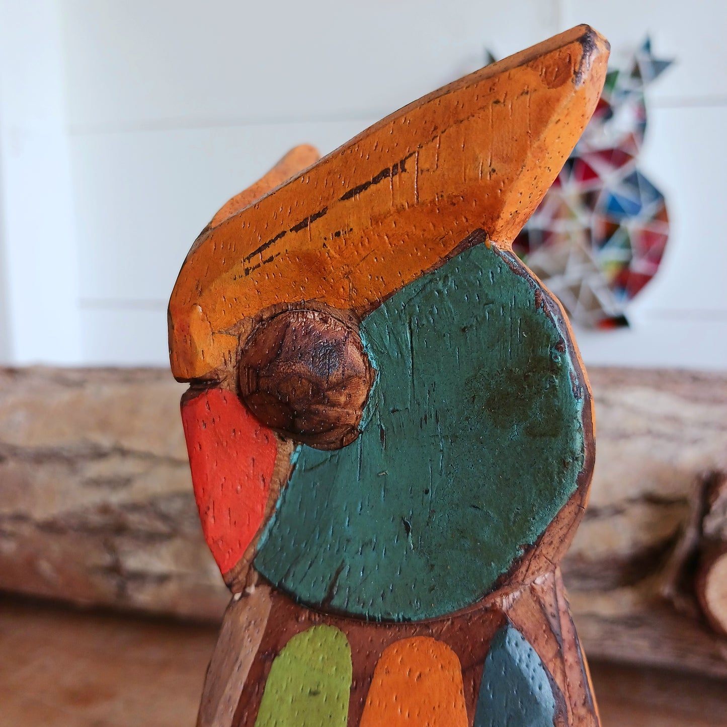 Bring a touch of nature and craftsmanship into your home with this beautifully hand-carved little wooden owl ornament. Carefully crafted from wood and finished in charming rustic colours, each owl is unique, showcasing the character and artistry of traditional woodcarving.