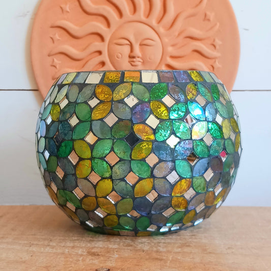 Add a warm, colourful glow to your home with this large and beautiful handmade Meena mosaic glass tealight holder, crafted by a World Fair Trade Organisation (WFTO) approved supplier in India.
