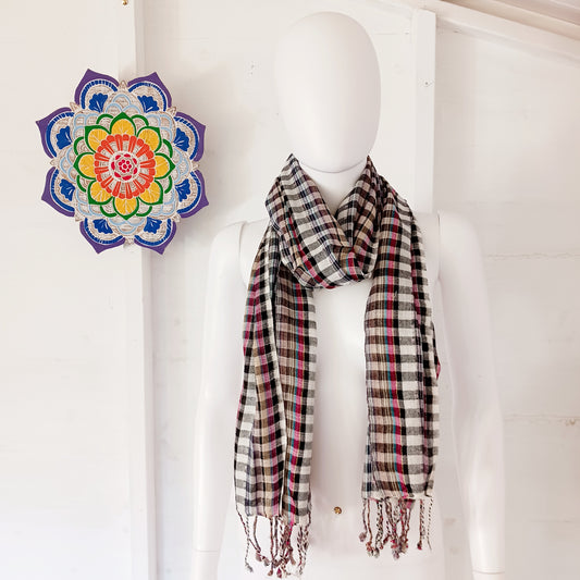 Immerse yourself in the alluring world of bohemian fashion with this delicate Indian Boho Scarf. Crafted with care, each scarf captures the essence of India's free-spirited charm, adding a touch of Boho elegance to your outfit.