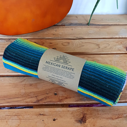 Bring bold colour and cultural charm into your space with our Mexican Serape Vibrant Green Blanket. Inspired by traditional Mexican festival textiles, this eye-catching throw features striking tones and classic serape stripes that instantly brighten any room.