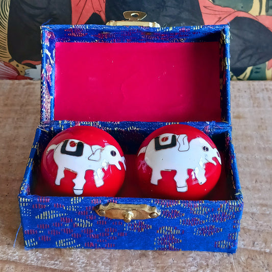 Boost hand flexibility and focus with Chinese Health Balls. Includes 2 chime balls in a silk brocade box. Ideal for relaxation, therapy, and energy balance.