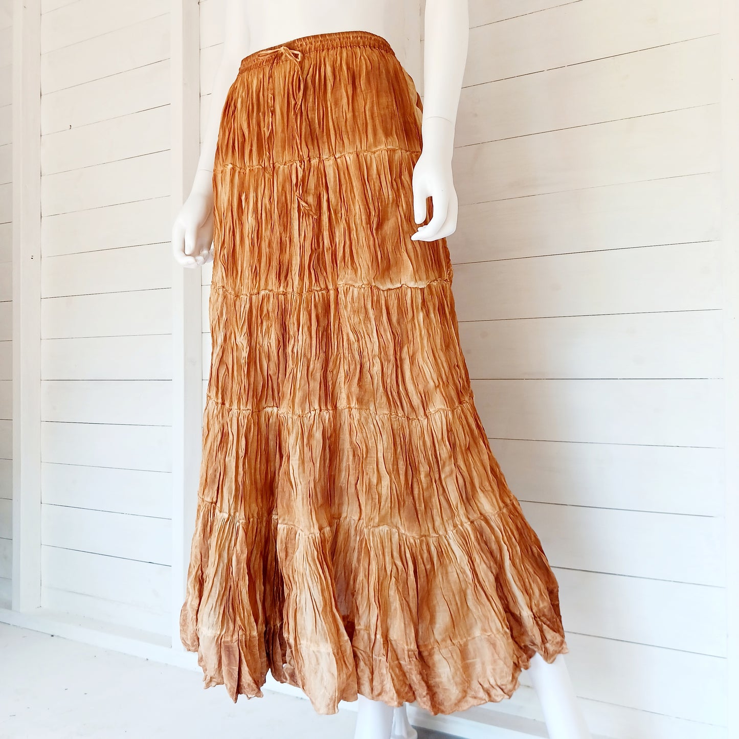 This beautiful Indian crinkle skirt is lovely and light so you can move with ease and comfort on a sunny day or a hot night. Made from rayon crepe, you can’t go wrong with this lovely skirt, it will add to your flowing summer style. And as rayon is quick drying, it also makes this a great beach cover up skirt.