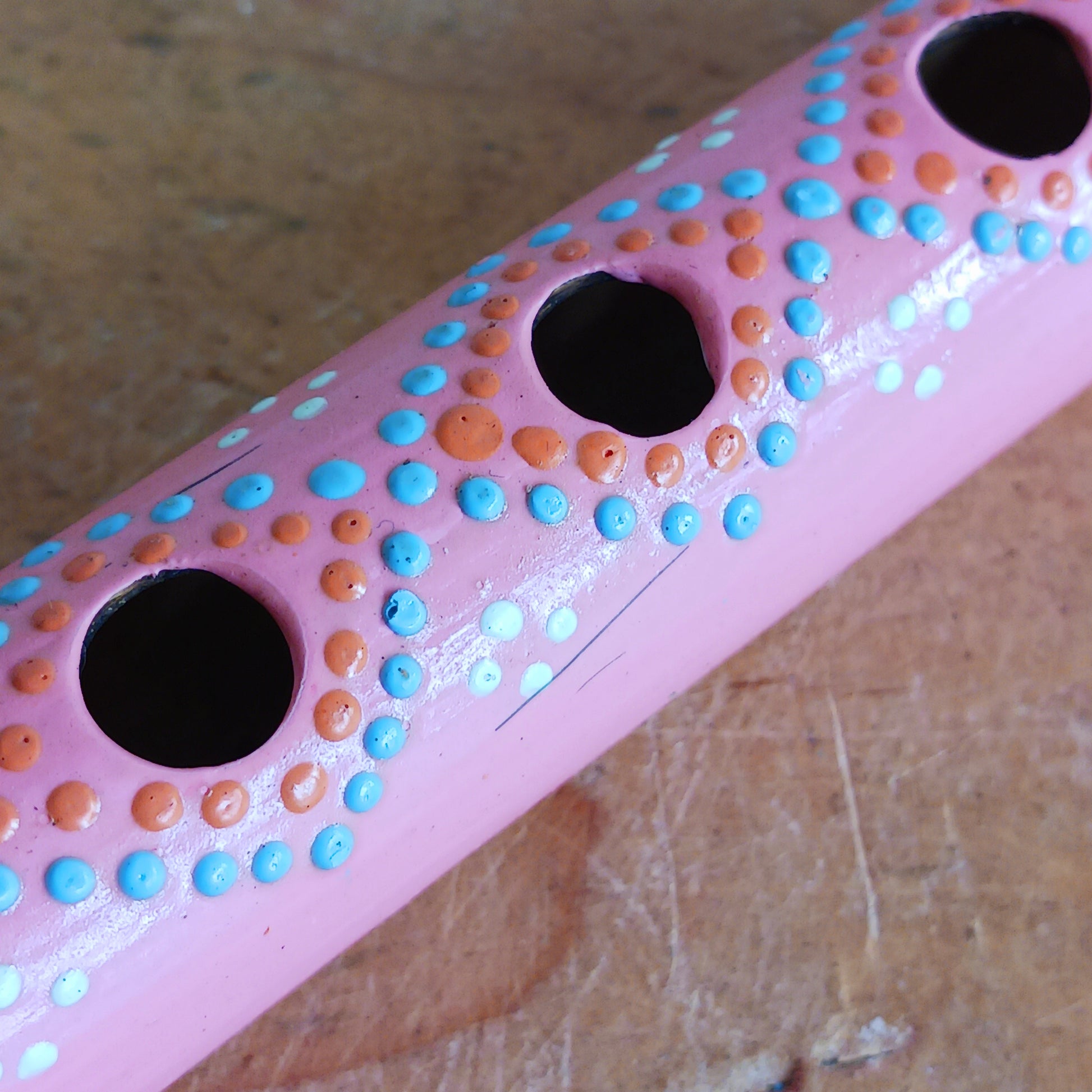 Introduce your little ones to the joy of music with these handcrafted pastel bamboo flutes. Available in three pretty colours, these fair trade instruments are an affordable and eco-friendly way to spark creativity, encourage musical play, and provide a delightful alternative to screen time. Each flute is carefully made from natural bamboo and hand-painted by skilled artisans, making every piece unique. Perfect as a gift or as a fun addition to your child’s toy collection.