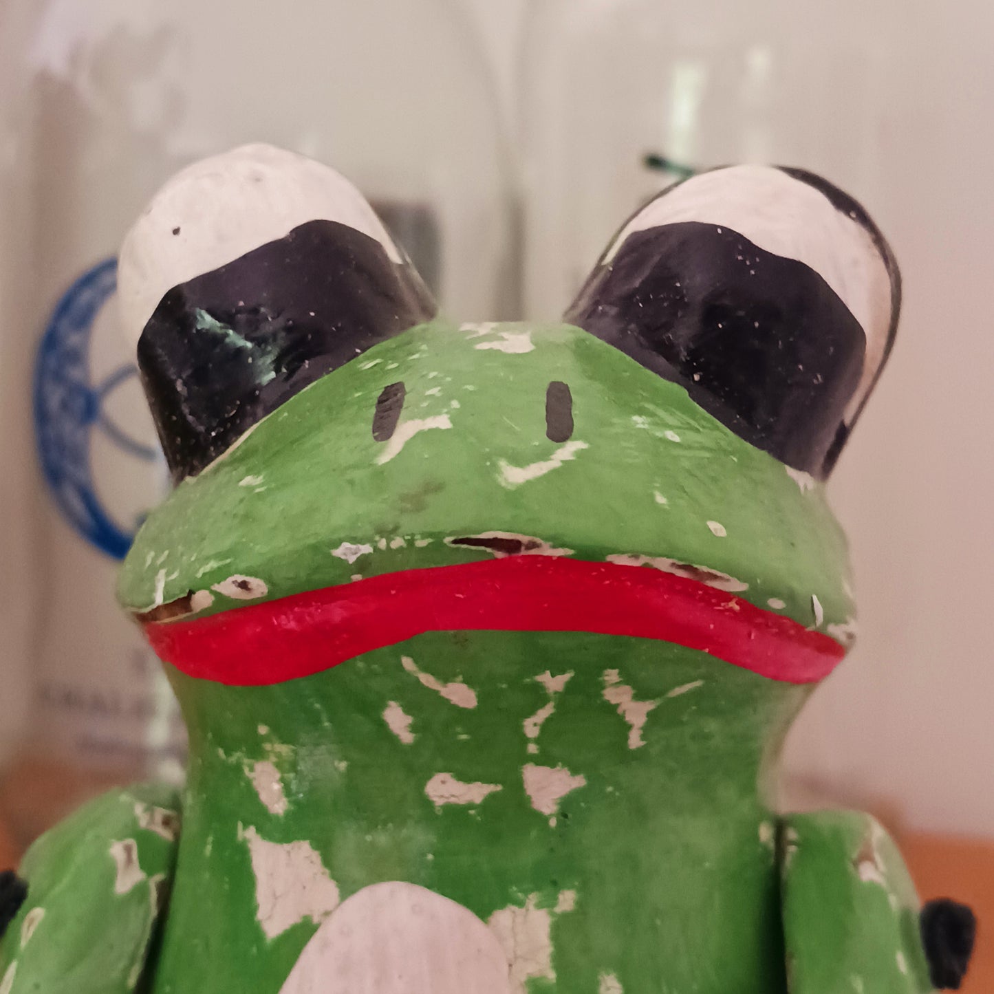 Add a playful touch of nature-inspired charm to your home with our Charming Green Sitting Frog Shelf Sitter Ornament. Featuring a vibrant green finish and an irresistibly sweet expression, this adorable frog is designed to bring joy and personality to any room.