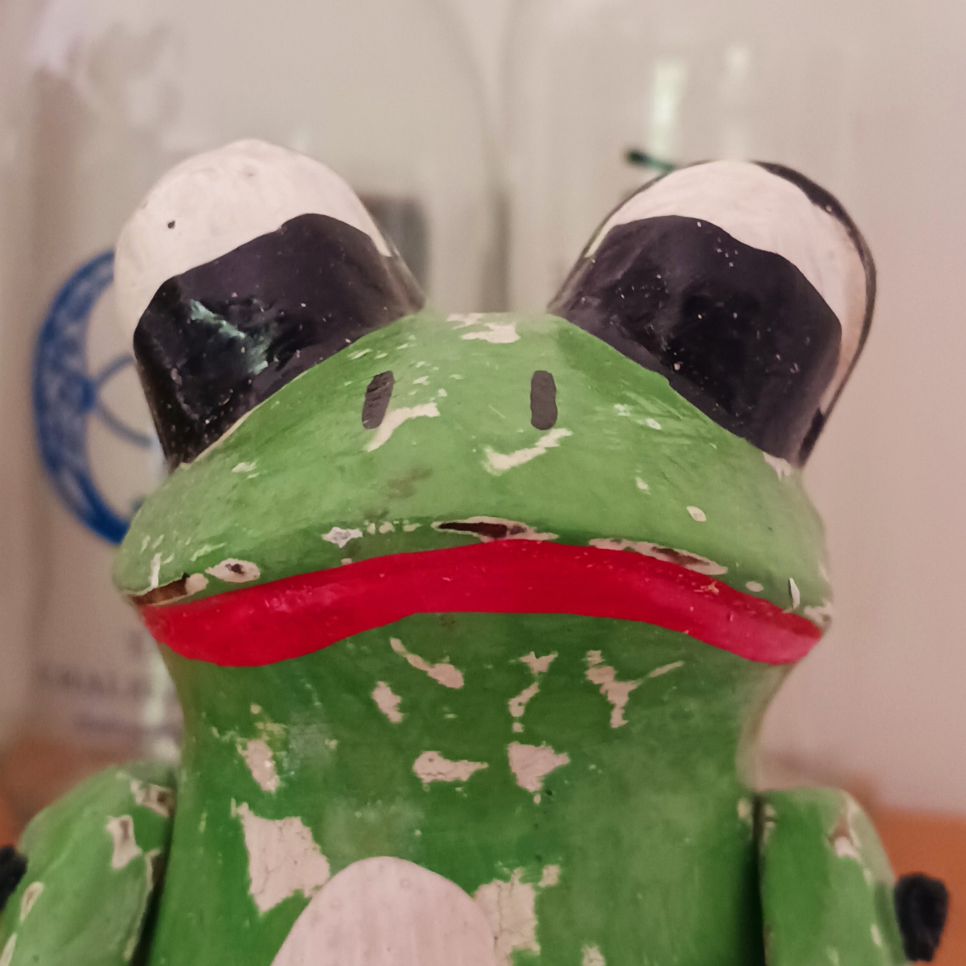 Add a playful touch of nature-inspired charm to your home with our Charming Green Sitting Frog Shelf Sitter Ornament. Featuring a vibrant green finish and an irresistibly sweet expression, this adorable frog is designed to bring joy and personality to any room.