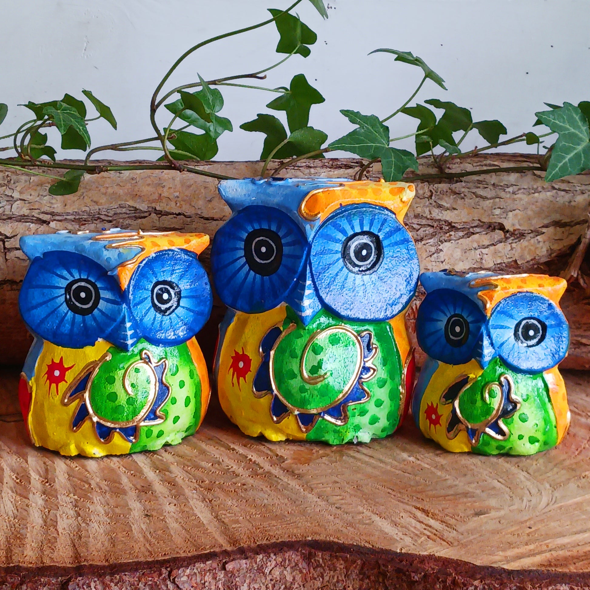 Add a pop of colour to your home décor with these beautifully hand painted Psychedelic Owls. These vibrant and quirky owl figurines instantly brighten any room with their playful charm.