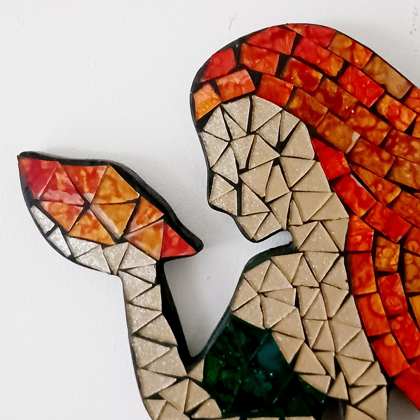 Transform your space with this beautiful Mosaic Mermaid Wall Decor, designed to inspire wonder and enchantment. Featuring intricate mosaic detailing, this magical mermaid captures light beautifully, adding texture, depth, and visual interest to any room.