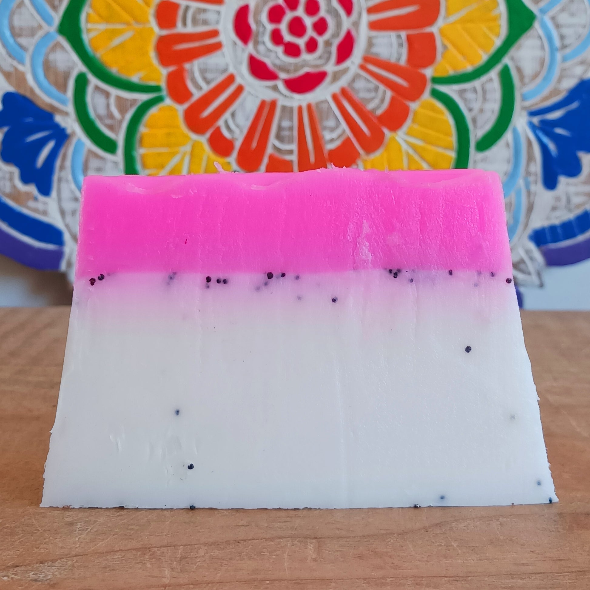 Treat yourself to a tropical burst of fragrance with this wonderful Dragon Fruit Handmade Soap. Lovingly made using the melt-and-pour method, this beautifully scented soap combines a delicious dragon fruit fragrance with poppy seeds to provide a gentle exfoliating scrub that helps remove dead skin, leaving hands and body feeling smooth, refreshed and nourished.