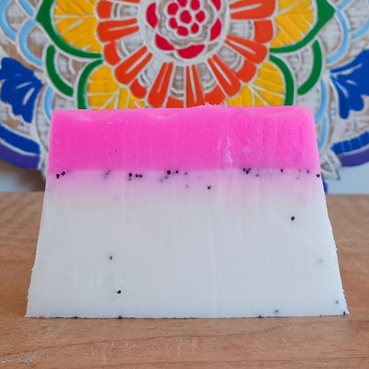 Treat yourself to a tropical burst of fragrance with this wonderful Dragon Fruit Handmade Soap. Lovingly made using the melt-and-pour method, this beautifully scented soap combines a delicious dragon fruit fragrance with poppy seeds to provide a gentle exfoliating scrub that helps remove dead skin, leaving hands and body feeling smooth, refreshed and nourished.