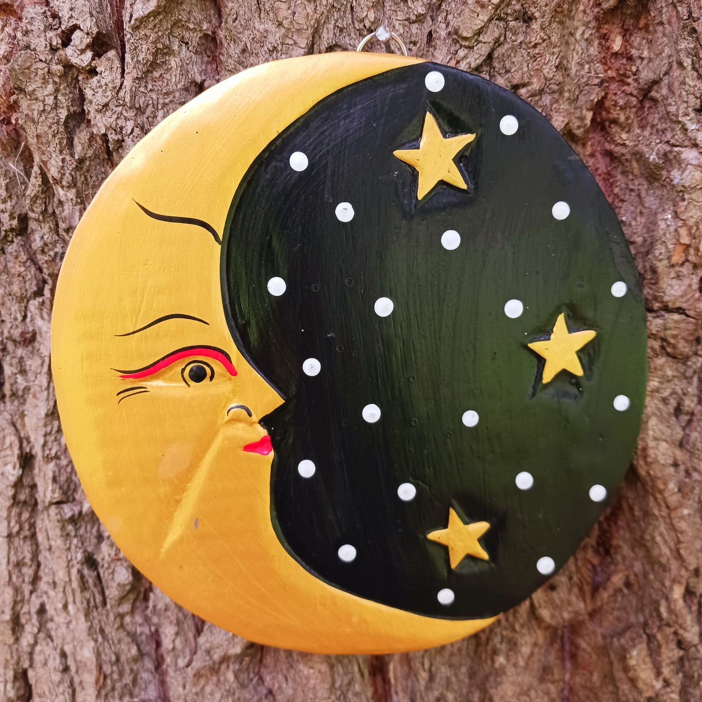 Bring celestial charm and mystical elegance into your space with this Black and Gold Moon Plaque. Hand-carved by skilled Balinese artisans from sustainably sourced wood, this stunning wall piece pairs the gentle energy of the moon with a dramatic black and gold colour palette.