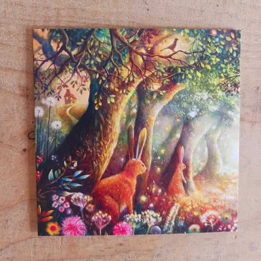 Lovely greetings card picturing two hares in a woodland scene. Card is blank inside for you to write your own message.