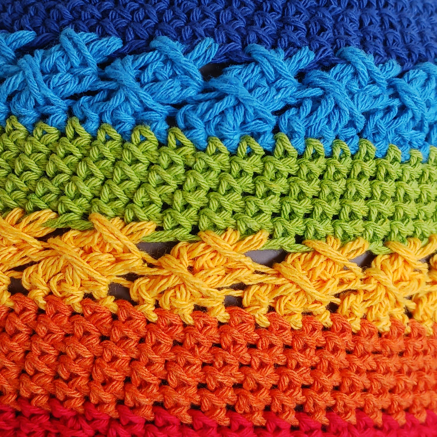 Handmade rainbow crochet sun hat with a flexible brim. Perfect for holidays, beach days & festivals. Unique, lightweight, and ready for sunny adventures!