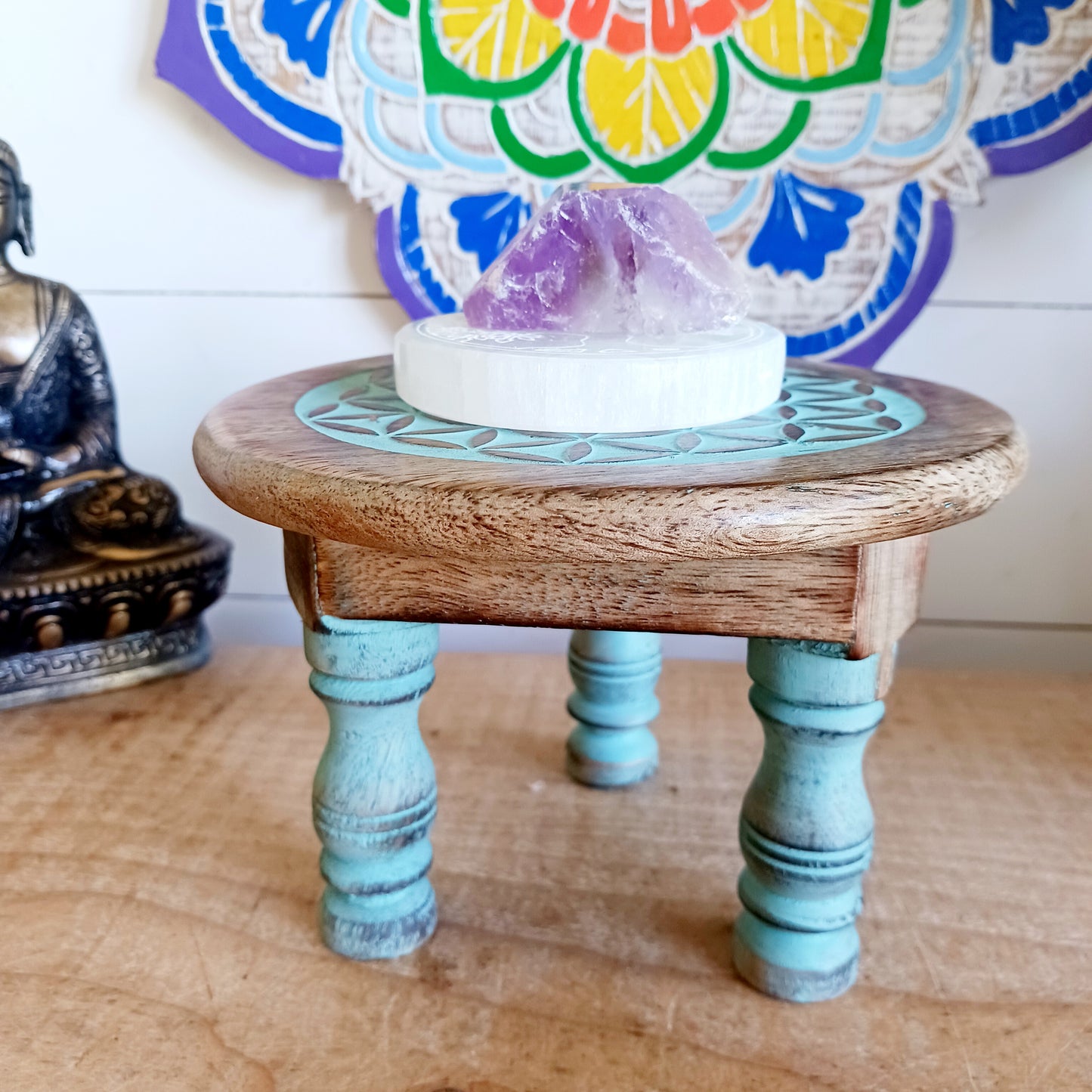 Bring the beauty of sacred geometry into your space with these compact Flower of Life tables. Handcrafted from solid mango wood, each table features a finely engraved Flower of Life symbol on top – an ancient pattern representing the interconnectedness of all life. 