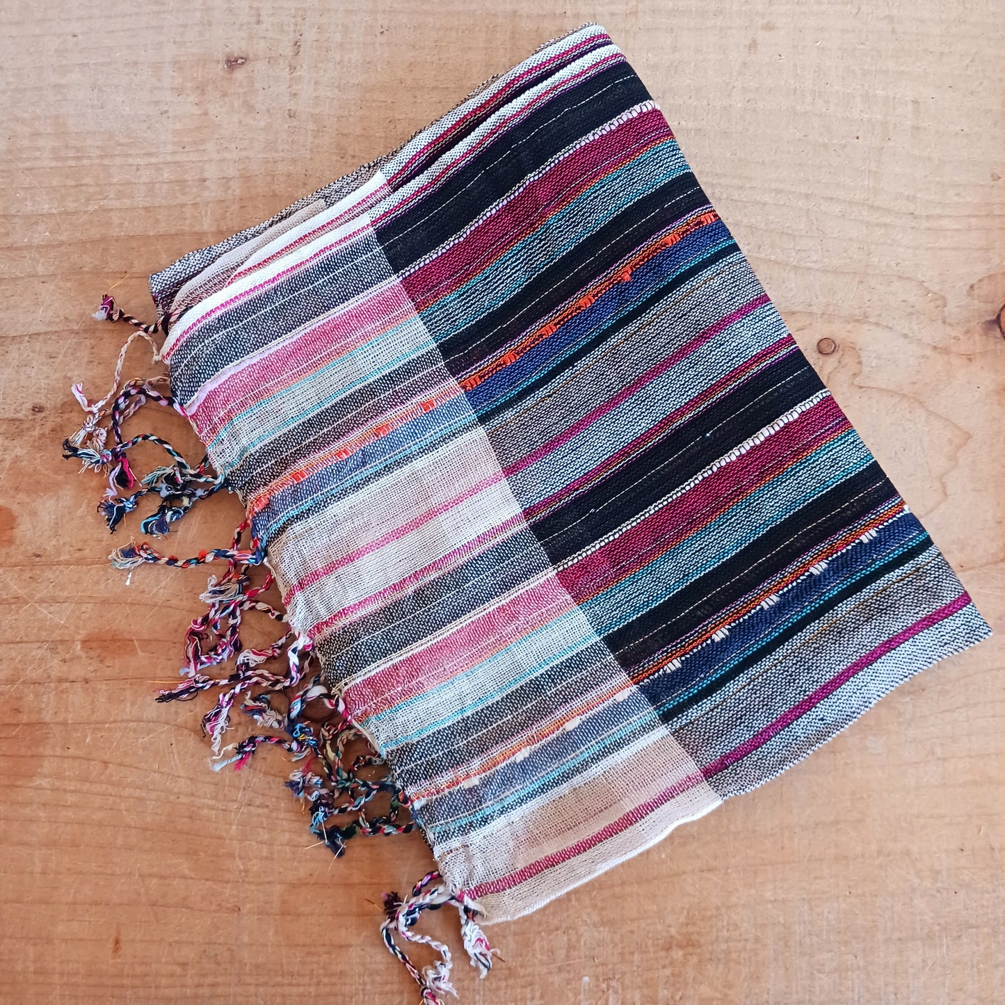 Immerse yourself in the alluring world of bohemian fashion with this delicate Indian Boho Scarf. Crafted with care, each scarf captures the essence of India's free-spirited charm, adding a touch of Boho elegance to your outfit.