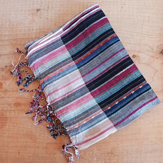 Immerse yourself in the alluring world of bohemian fashion with this delicate Indian Boho Scarf. Crafted with care, each scarf captures the essence of India's free-spirited charm, adding a touch of Boho elegance to your outfit.