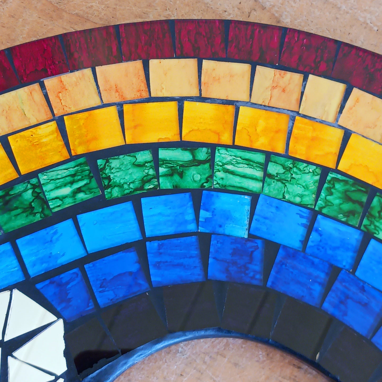 Bring colour, light, and personality into your home with the Mosaic Rainbow Wall Mirror Plaque. Featuring a vibrant rainbow-inspired mosaic design with a reflective mirror centre, this decorative wall plaque adds a cheerful touch to bedrooms, nurseries, playrooms, living spaces, or hallways.