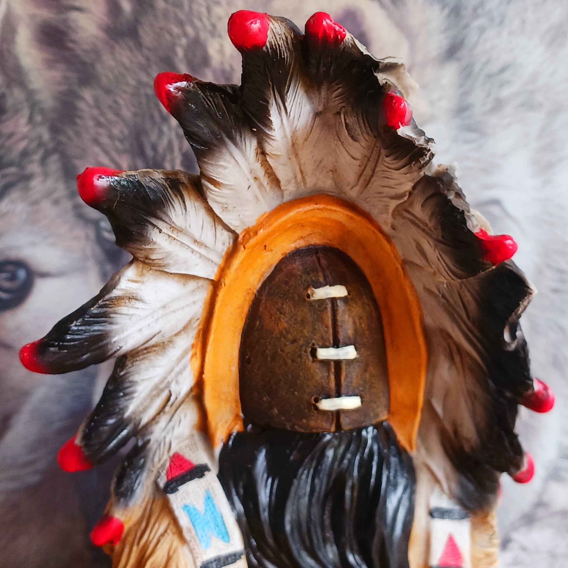 Elevate your space with the serene elegance of this Native American Chief Smoking a Peace Pipe figurine, a captivating symbol of wisdom and cultural harmony. Expertly crafted with intricate detail, this masterpiece depicts a noble chief in traditional tribal attire, smoking a symbolic peace pipe with grace and dignity. From the regal feathered headdress to the delicate carving of the pipe, every element reflects the artistry and cultural depth of Native American traditions. 