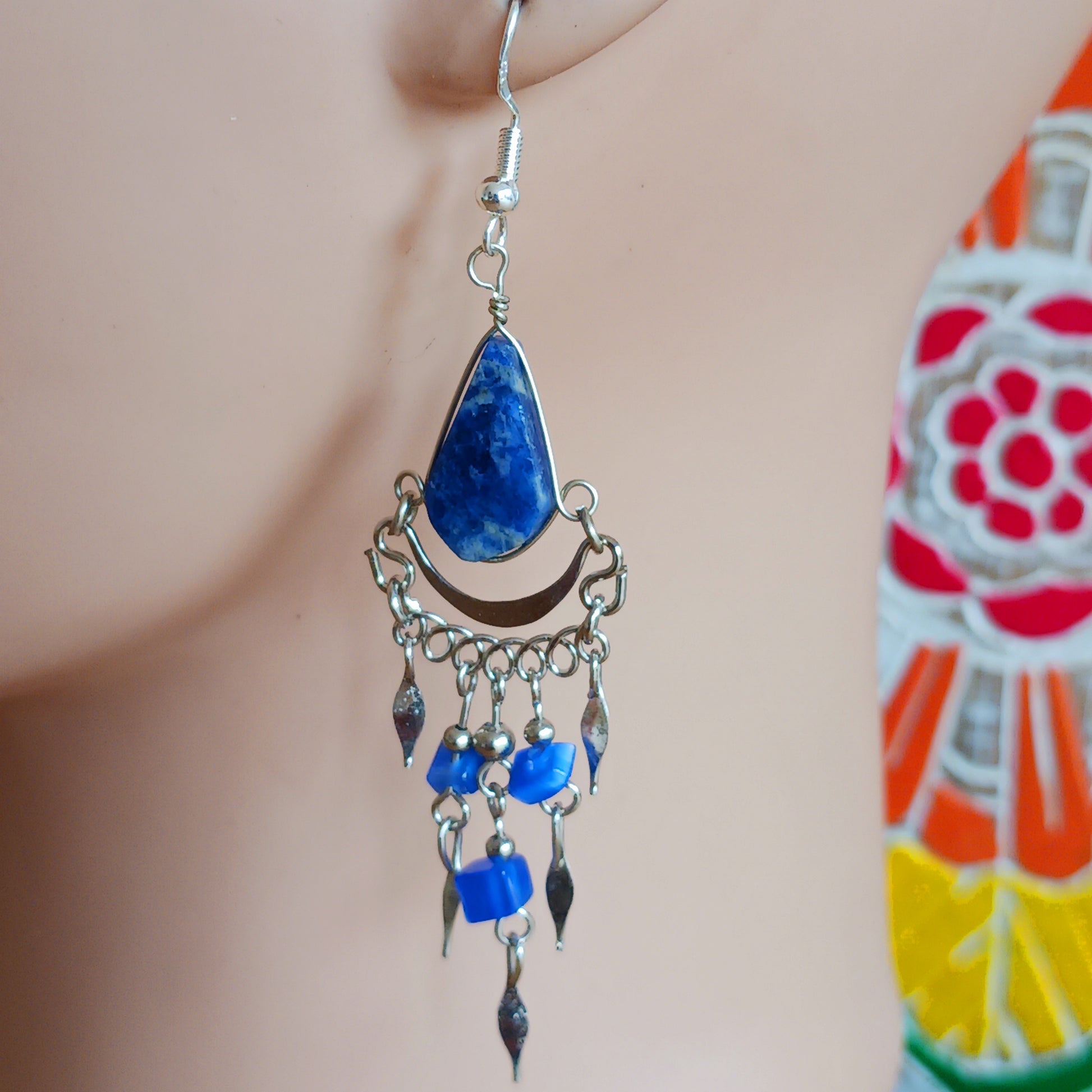 Add a touch of bohemian beauty to your look with these handmade Peruvian stone earrings. Featuring lapis lazuli stones and finished with silver-plated hooks, each pair is carefully crafted in small workshops in Peru.