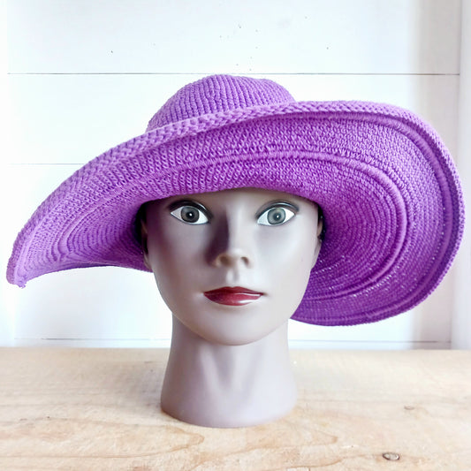 This lovely crochet cotton summer sun hat is perfect for summertime with it's vibrant purple colour.  Each hat has a malleable wire woven into the rim to help keep the shape.  Ideal for holidays and festivals.