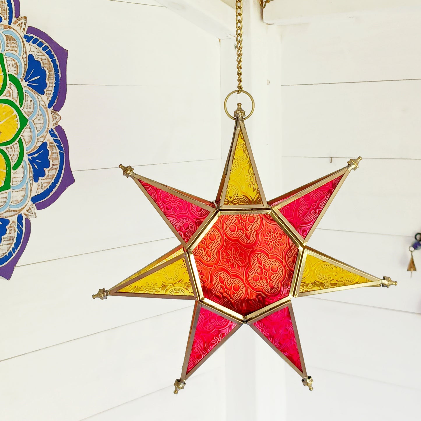 These Moroccan style star glass lanterns are handcrafted by skilled artisans and come in beautiful rich colours that catch the eye and instantly add atmosphere to any room.