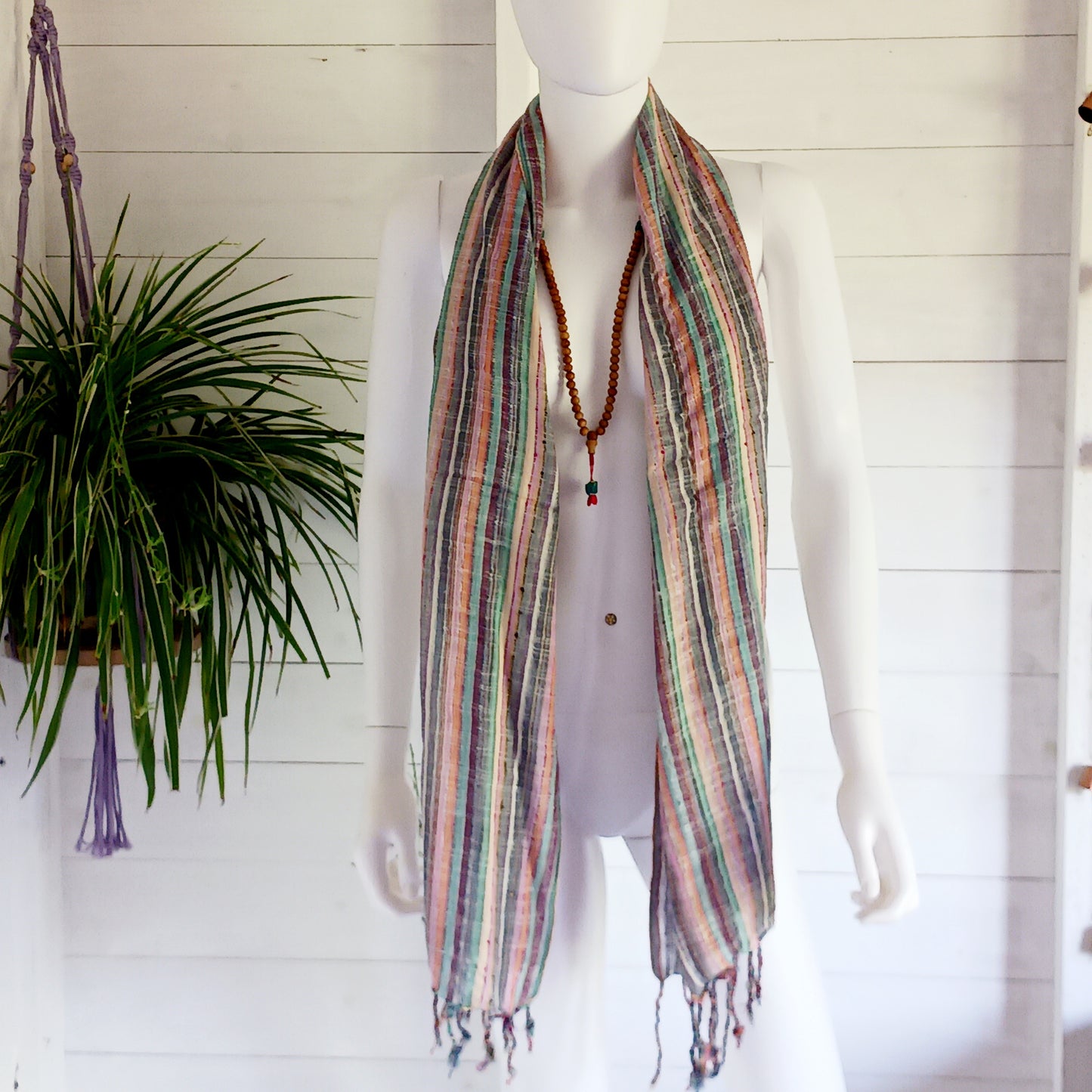 Immerse yourself in the alluring world of bohemian fashion with this delicate Indian Boho Scarf. Crafted with care, each scarf captures the essence of India's free-spirited charm, adding a touch of Boho elegance to your outfit. Whether draped effortlessly over your shoulders, wrapped as a headscarf, or styled with creative knots, this versatile accessory enhances your everyday fashion. Lightweight, breathable, and full of personality, it’s the perfect way to express your unique style.