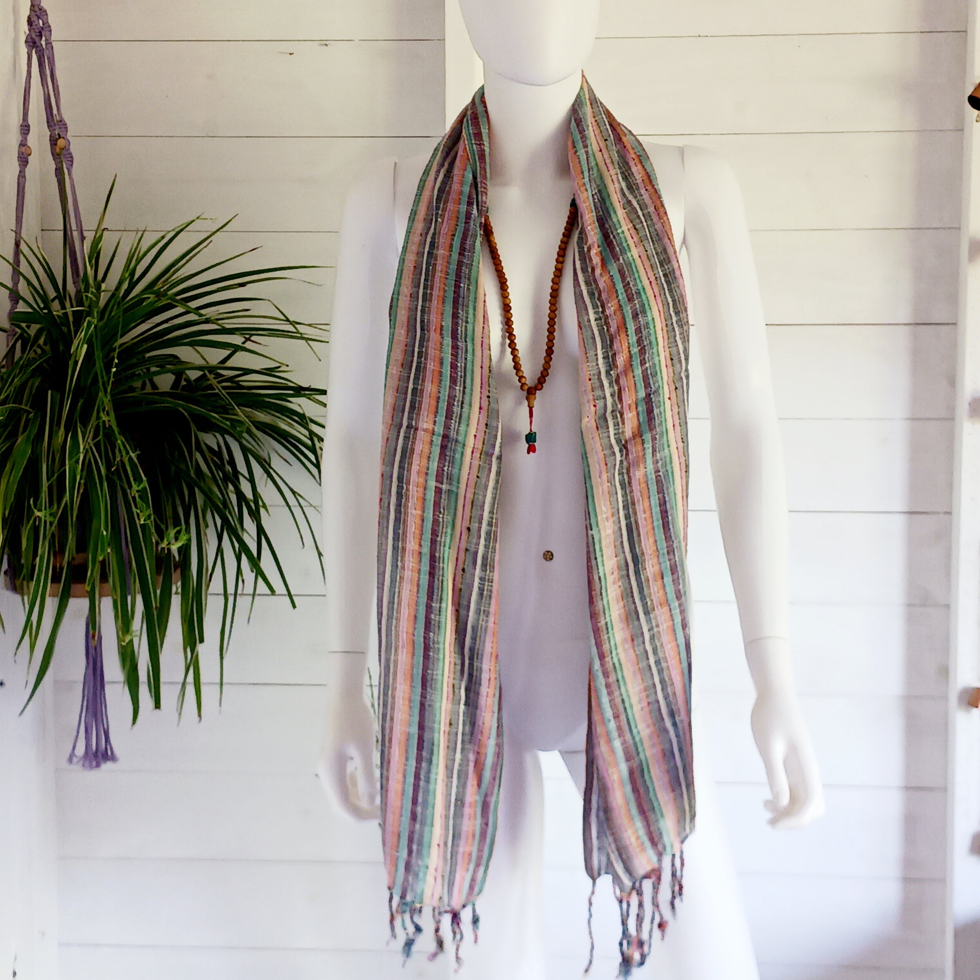 Immerse yourself in the alluring world of bohemian fashion with this delicate Indian Boho Scarf. Crafted with care, each scarf captures the essence of India's free-spirited charm, adding a touch of Boho elegance to your outfit. Whether draped effortlessly over your shoulders, wrapped as a headscarf, or styled with creative knots, this versatile accessory enhances your everyday fashion. Lightweight, breathable, and full of personality, it’s the perfect way to express your unique style.