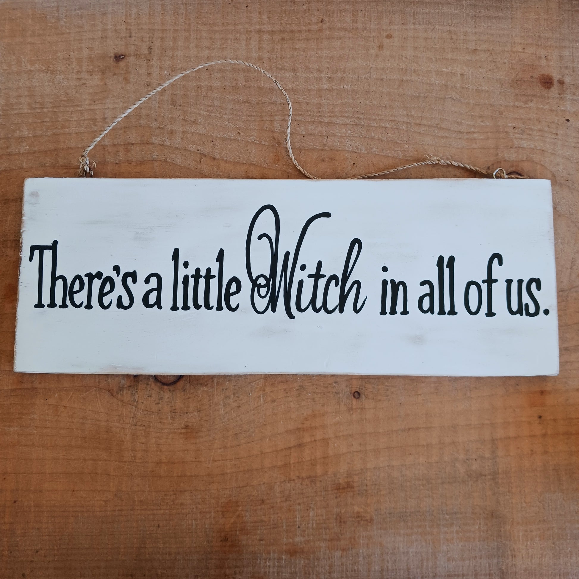 Celebrate your magical side with the There's a Little Witch in All of Us Wooden Wall Plaque. Featuring the enchanting quote, "There's a little Witch in all of us," this decorative wooden sign is a charming reminder to embrace your intuition, confidence, and unique spirit