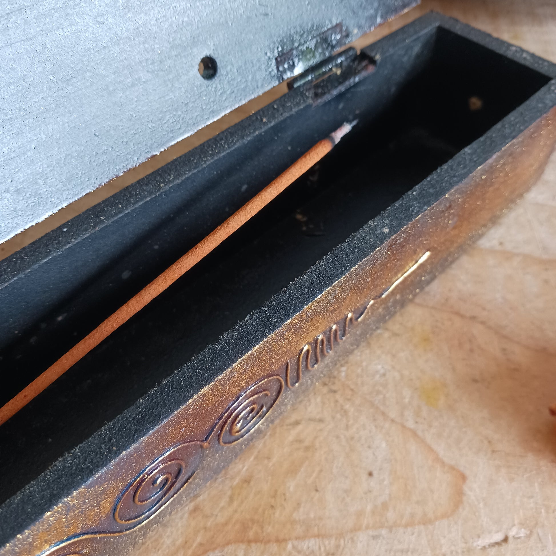 This unique incense stick holder is perfect to catch the ash from your favourite incense. It has been handmade from responsibly sourced wood, skillfully carved and decorated with a centre OM symbol.