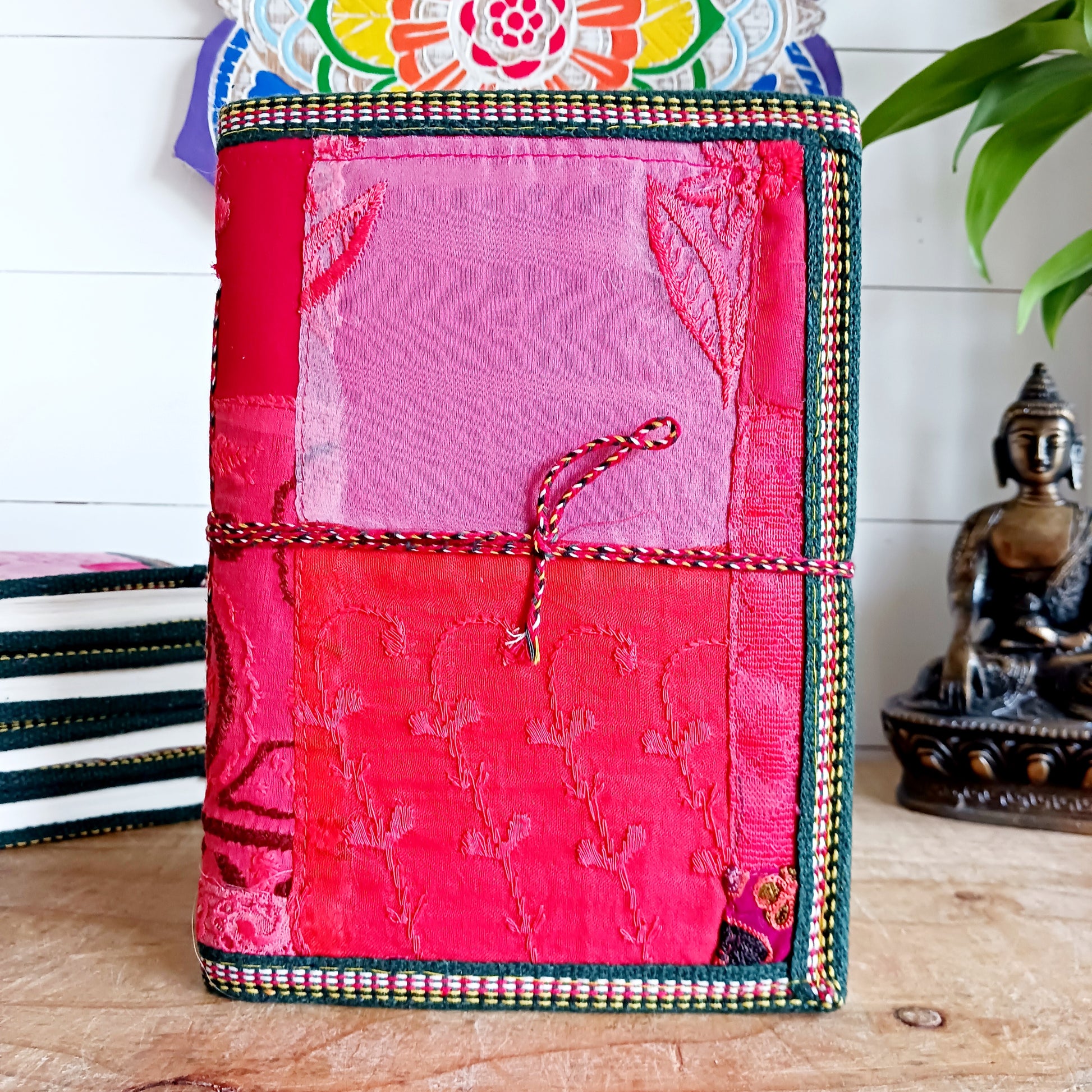 This beautifully bound notebook with handmade paper is from recycled cotton. An imaginative use for sari offcut material, the cover is edged and framed with pretty brocade material to complete a lovely and unique eco friendly stationery gift.