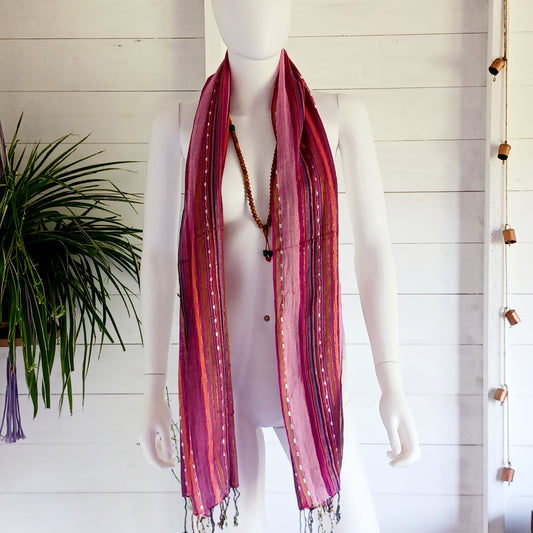 Immerse yourself in the alluring world of bohemian fashion with this delicate Indian Boho Scarf. Crafted with care, each scarf captures the essence of India's free-spirited charm, adding a touch of Boho elegance to your outfit. Whether draped effortlessly over your shoulders, wrapped as a headscarf, or styled with creative knots, this versatile accessory enhances your everyday fashion. Lightweight, breathable, and full of personality, it’s the perfect way to express your unique style.