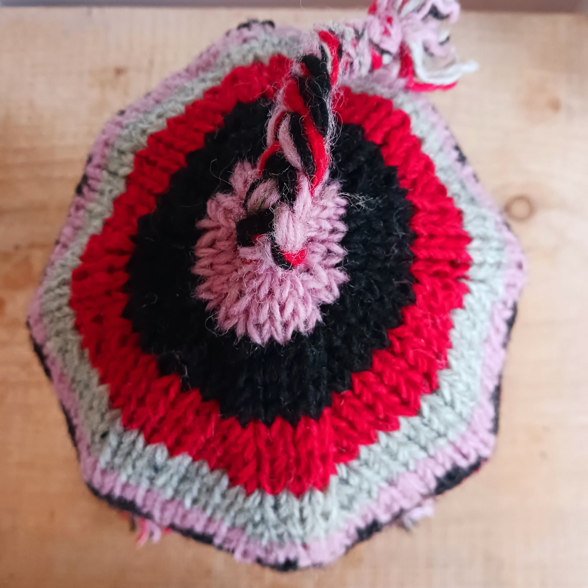 Stay cozy and stylish with our handmade chunky wool earflap hats, crafted in Nepal by skilled women artisans in Kathmandu. Each hat is 100% pure wool and features a soft polar fleece lining for extra warmth and comfort. Perfect for cold winter days, outdoor adventures, or adding a touch of handmade charm to your look.