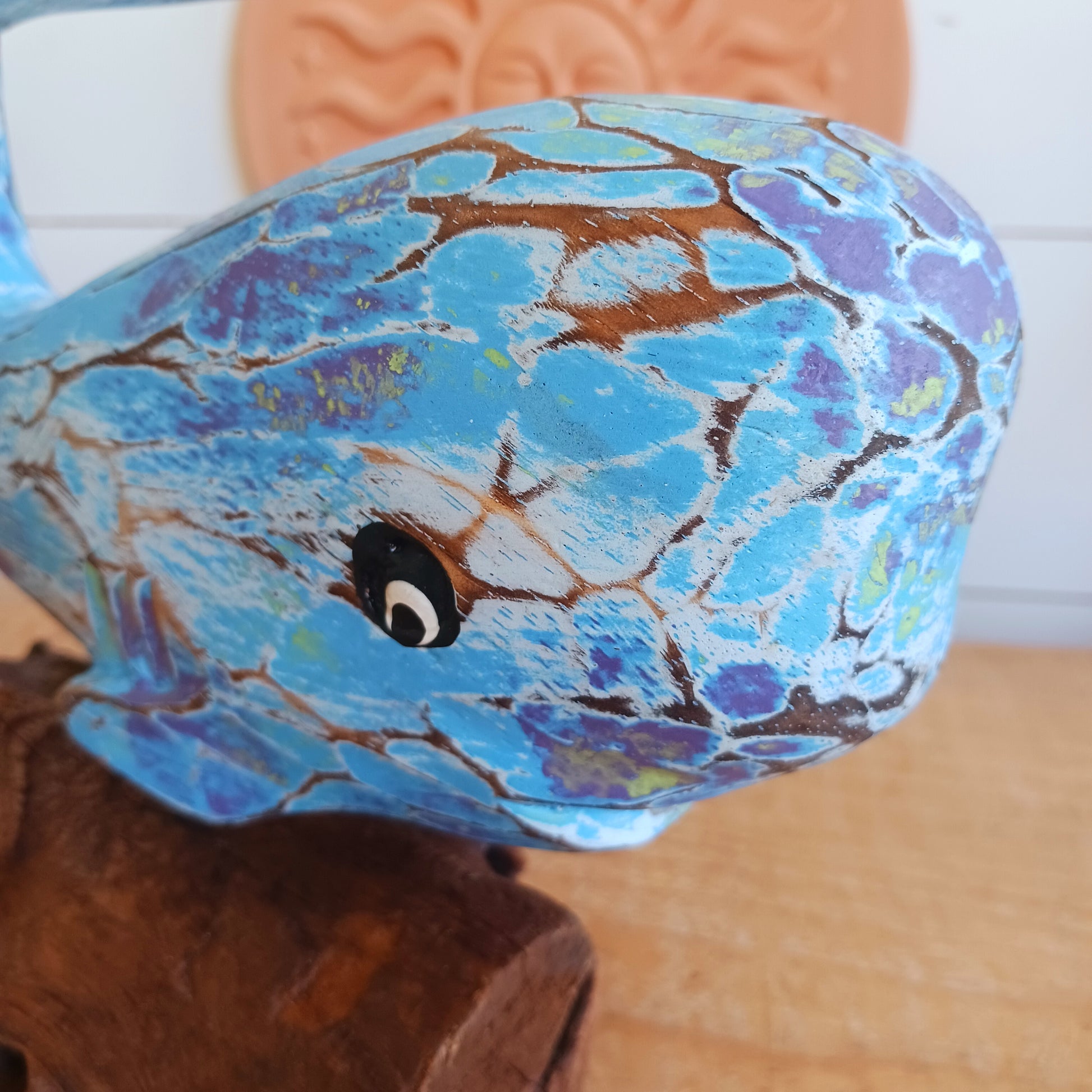 Bring the beauty of the coast into your home with this charming Colourful Wooden Whale. Handcrafted with a rustic finish and vibrant colours, this decorative wooden whale captures the relaxed spirit of seaside living. Whether displayed in a living room, bathroom, hallway, beach house, or coastal-themed space, it adds warmth, character, and nautical charm to your décor.