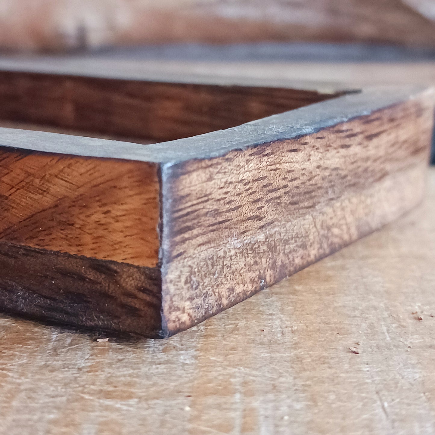 This Zodiac Incense Holder and Crystal Tray is a beautifully crafted ritual accessory made from natural mango wood and finished with gold-stamped astrological symbolism. Designed to hold incense sticks while offering a dedicated tray space for crystals or ritual objects, it brings structure and intention to daily practice.