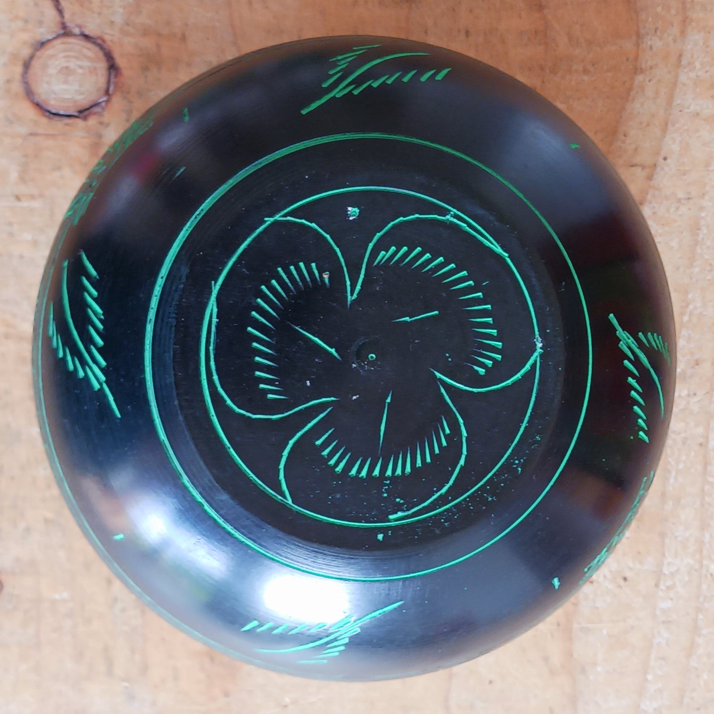 Bring a mystical and nature-inspired touch to your spiritual space with this beautifully crafted Black Aluminium Mushroom Singing Bowl. Handmade in India, this unique cauldron-style singing bowl features a striking black finish decorated with vivid green mushroom artwork, creating an eye-catching piece perfect for meditation rooms, altars, yoga studios, and bohemian interiors.