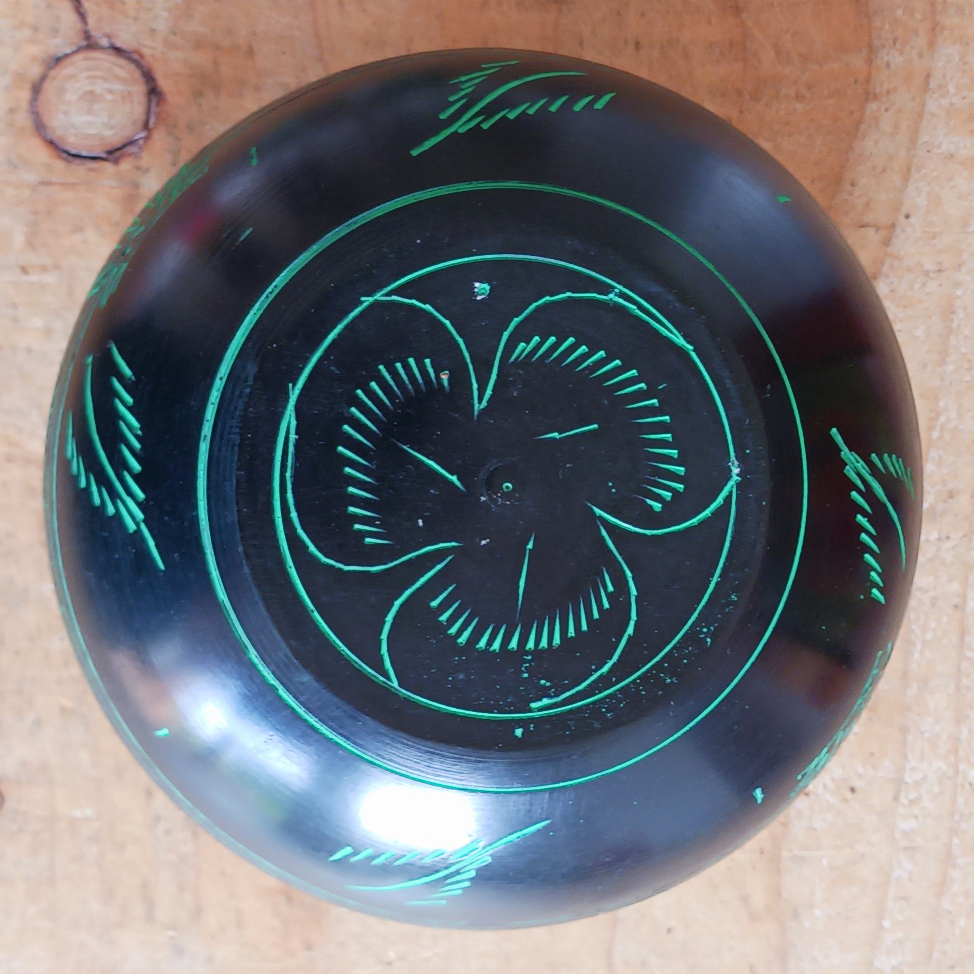 Bring a mystical and nature-inspired touch to your spiritual space with this beautifully crafted Black Aluminium Mushroom Singing Bowl. Handmade in India, this unique cauldron-style singing bowl features a striking black finish decorated with vivid green mushroom artwork, creating an eye-catching piece perfect for meditation rooms, altars, yoga studios, and bohemian interiors.