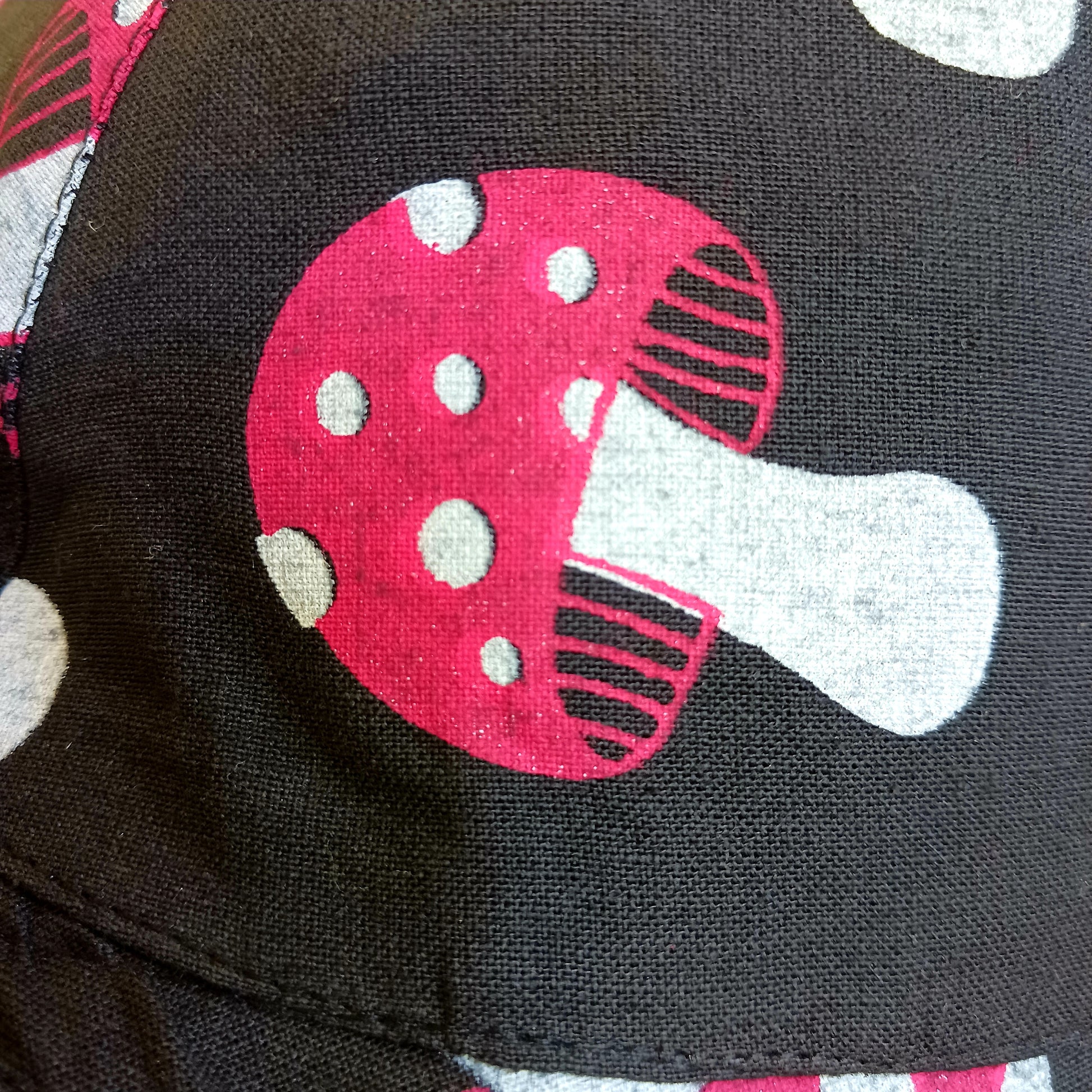 Stand out from the crowd with this lightweight Festival Mushroom Print Bucket Hat. Designed for festival season, holidays, beach days, and everyday summer wear, this stylish bucket hat features a bold all-over mushroom print that adds a fun, eye-catching touch to any outfit.