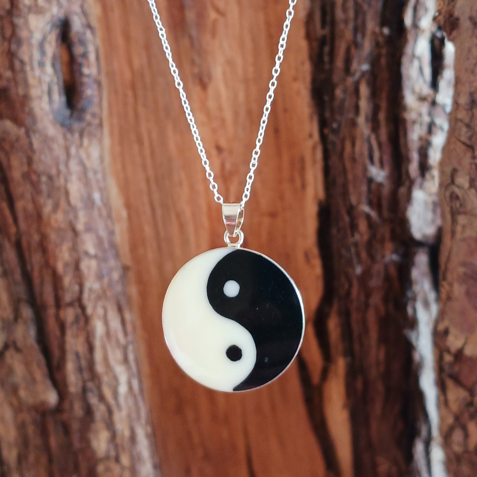 This sterling silver Yin Yang pendant on a silver chain is intended to balance the mind. Handcrafted for durability and designed to last a lifetime.